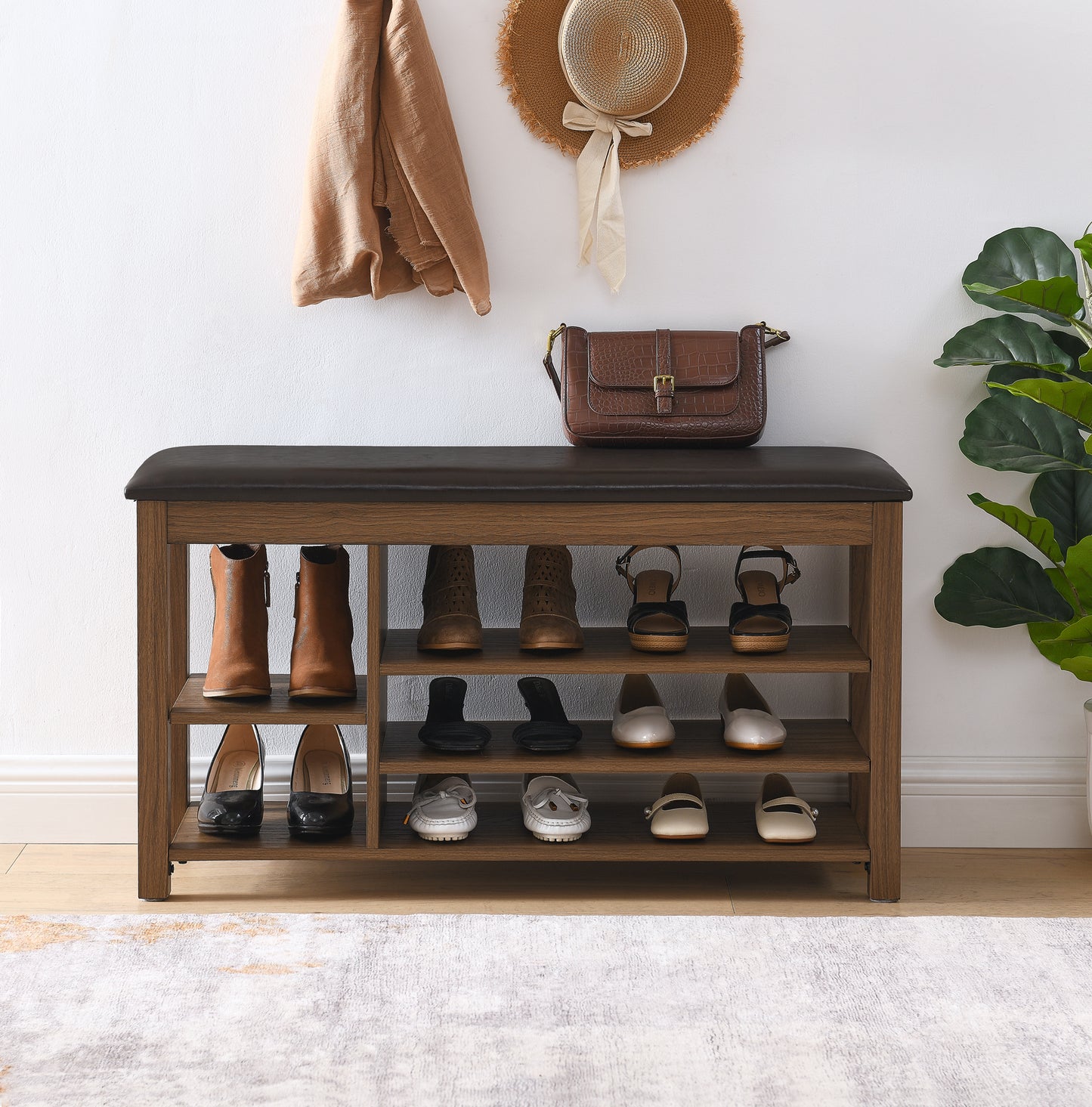 A height-adjustable long shoe-changing bench,made of natural rubberwood,comes with a comfortable seat,concealed storage space and large storage compartments. features natural wood grain.Brown